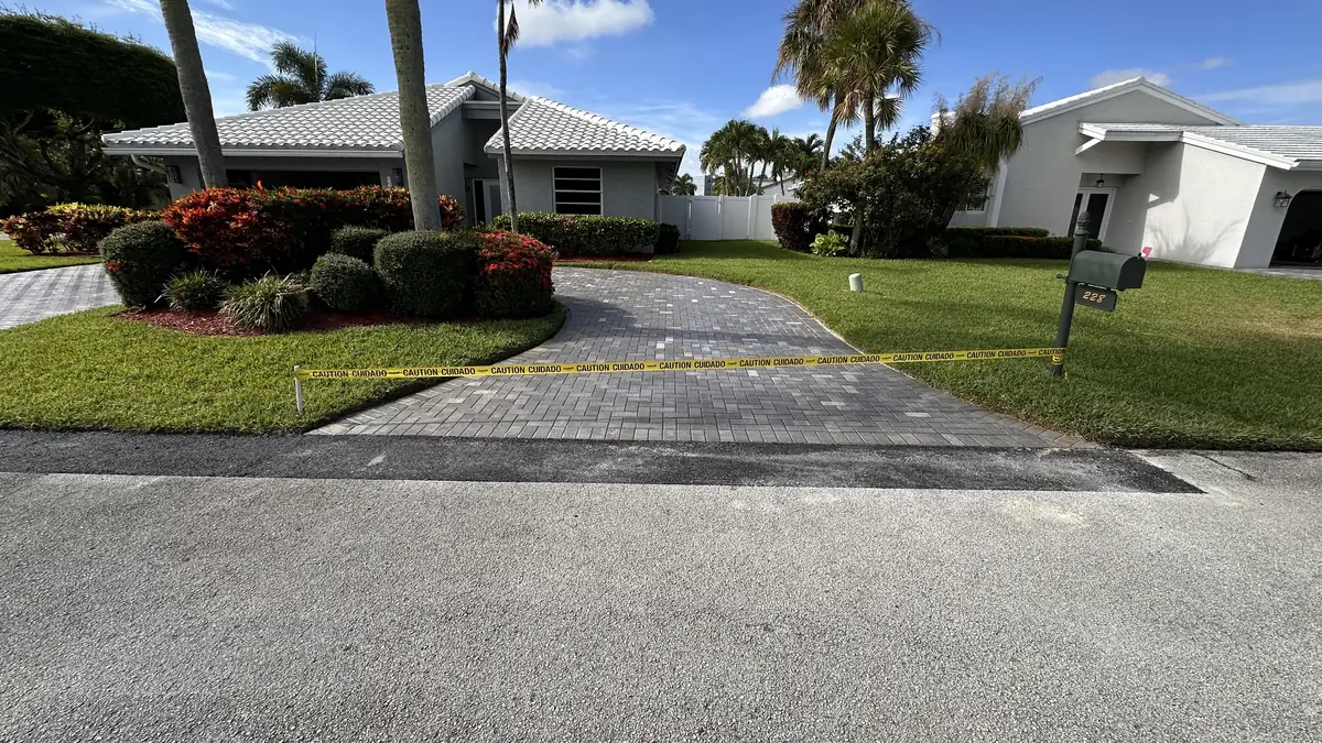 Driveway Paver Apron & Asphalt Edge Repair work by Palm Beach Pavers